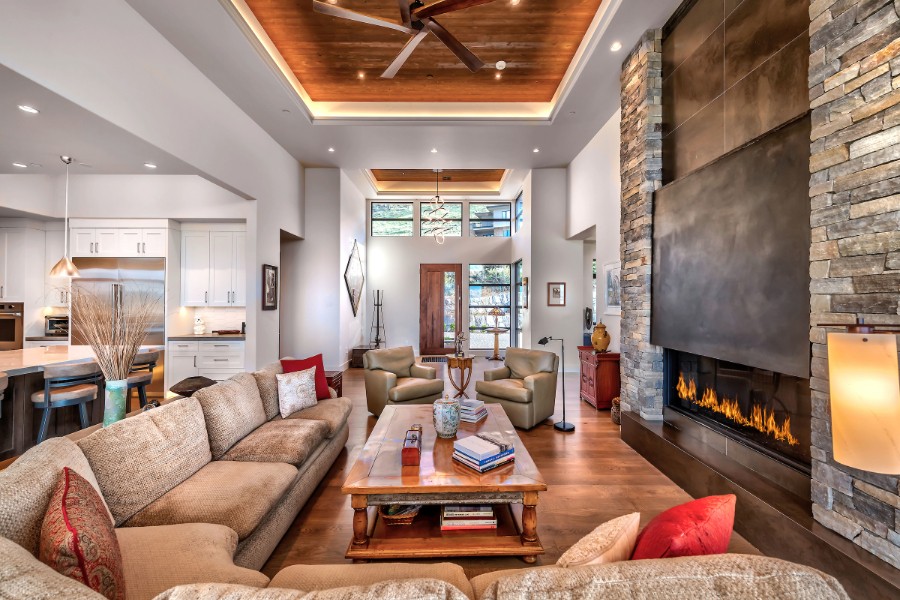 Inviting living room featuring fireplace, furniture, and coffee table.