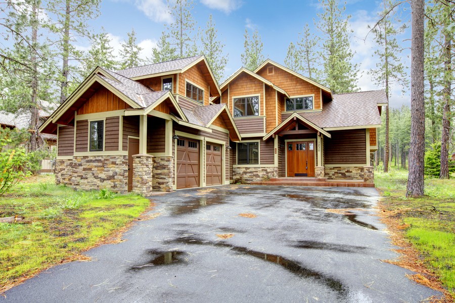 Image is of the exterior of a two-story, two-car garage home. 