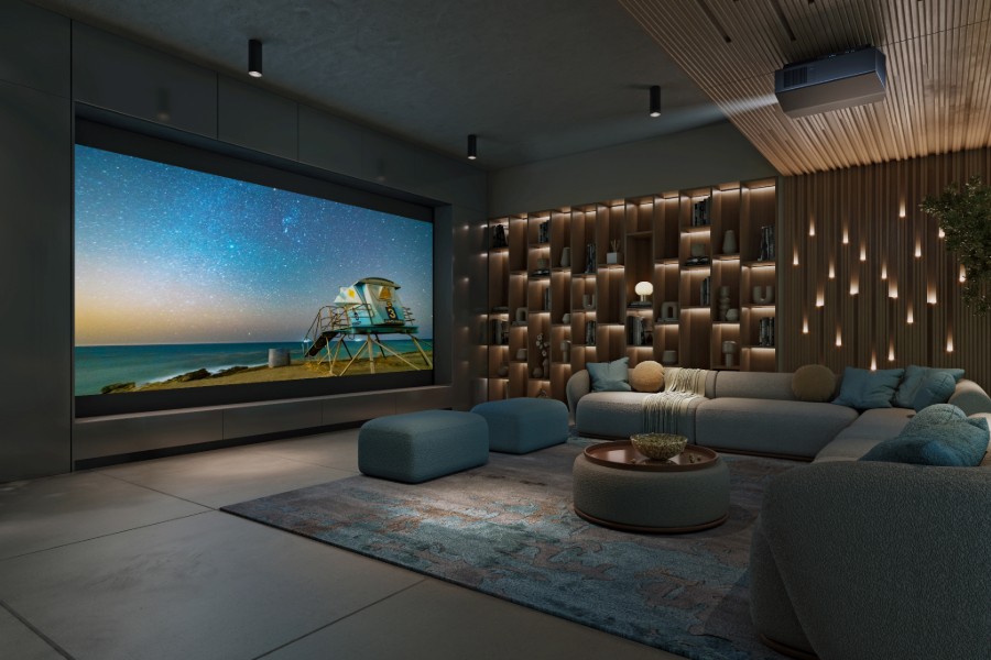 A modern home theater showcasing a big screen, plush seating, and stylish decor. 